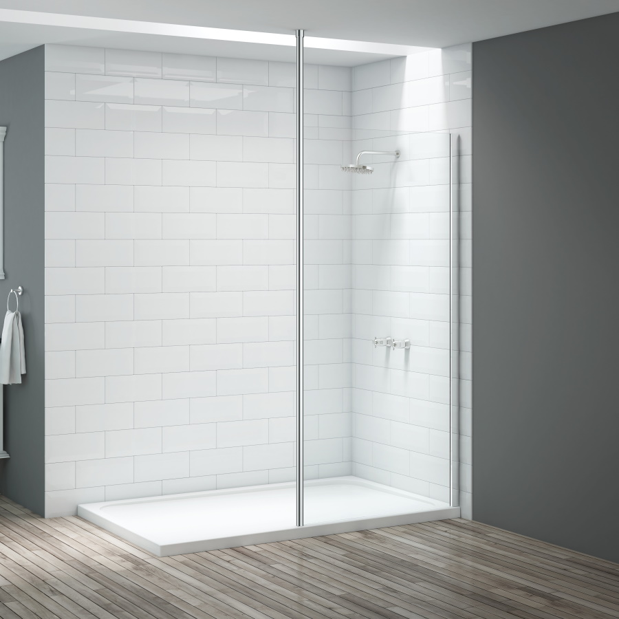 Pure white walk in shower fitted with a vertical screen