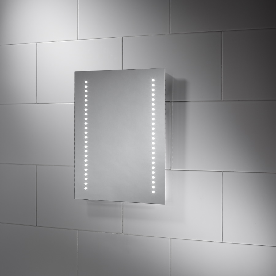 Calypso Mirror on tiled wall